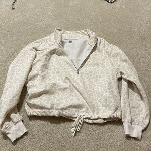 Cropped quarter zip. Soft inside.